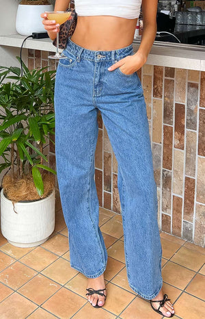 Mid wash mid rise slouchy denim jeans.