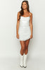 White sequin mini dress on brunette model