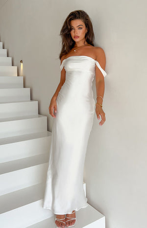 White satin maxi dress with off the shoulder straps on brunette model