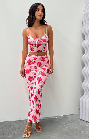 Pink floral mesh maxi skirt on brunette model