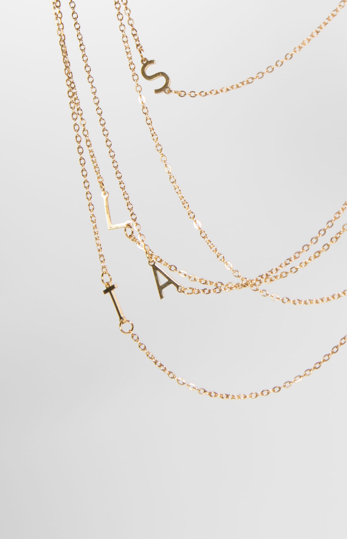 Icy Elegance Gold Stainless Steel Initial Necklace Image