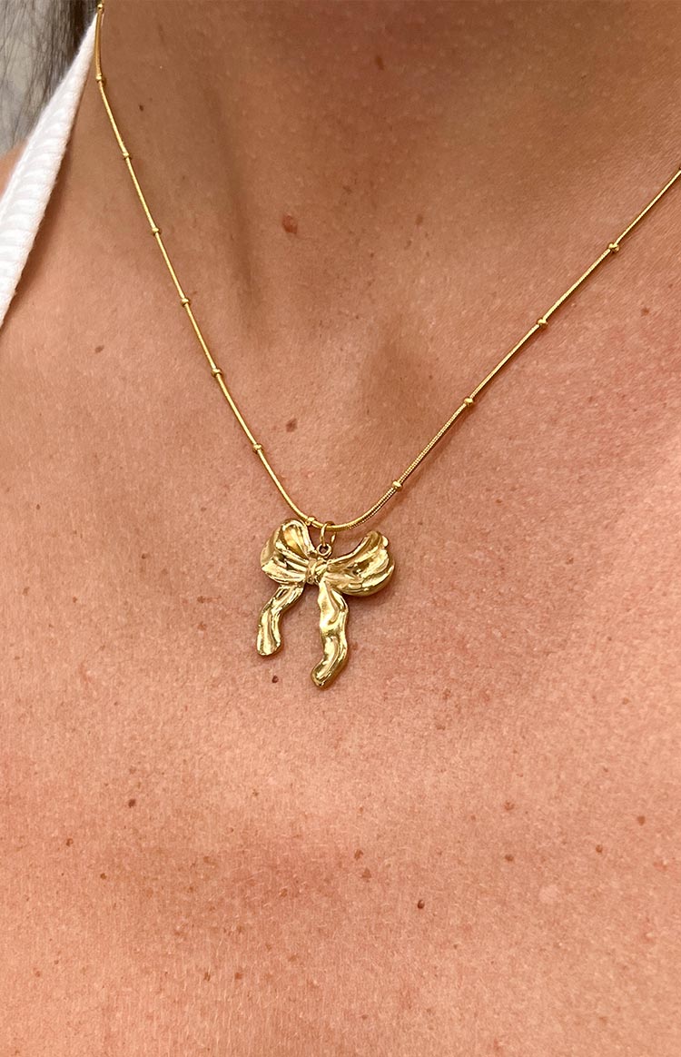 Leander Gold Bow Knot Pendant Necklace Image