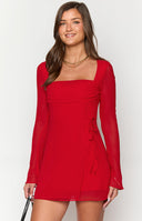 Red long sleeve mini dress with a wrap skirt front.