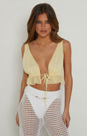 Poppy yellow crop top with centre bust adjustable tie on Brit Harvey.