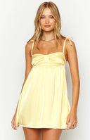 Yellow satin cup dress.