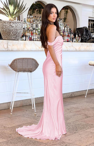 Pink maxi off-shoulder formal dress worn on brunette model